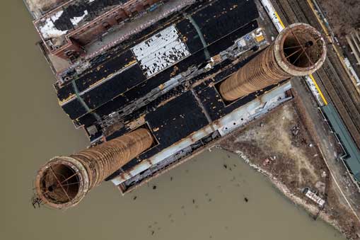 -of-two-rustic-industrial-chimneys-